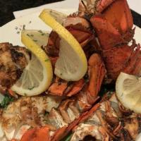 Lobster Bowl · 14oz grilled Cajun lobster tails topped with garlic butter. Served with mashed potatoes