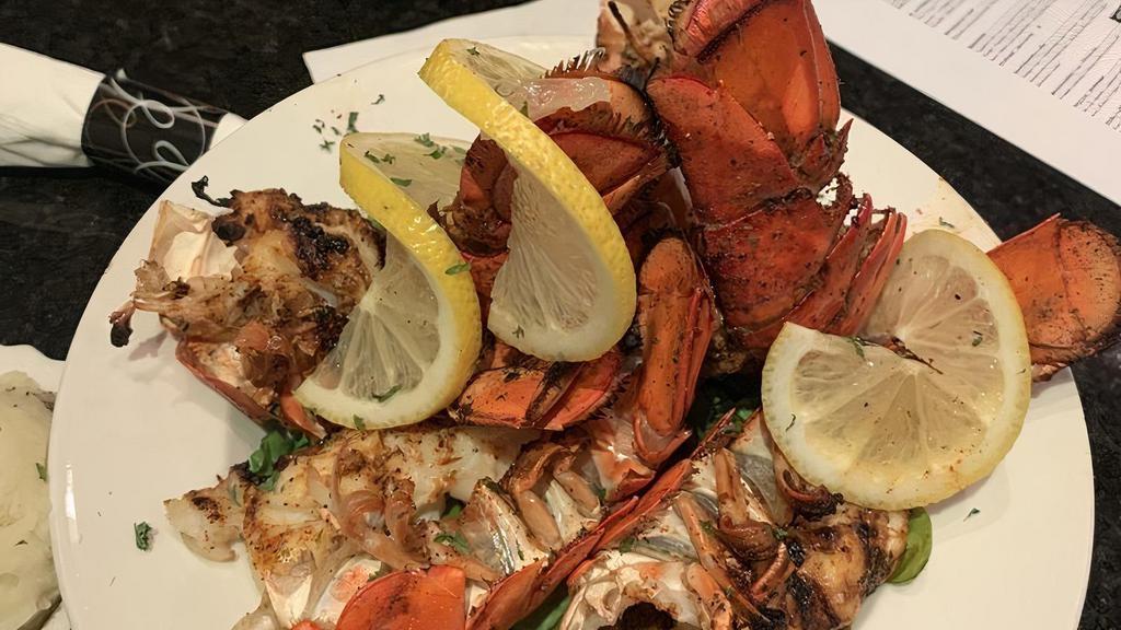 Lobster Bowl · 14oz grilled Cajun lobster tails topped with garlic butter. Served with mashed potatoes