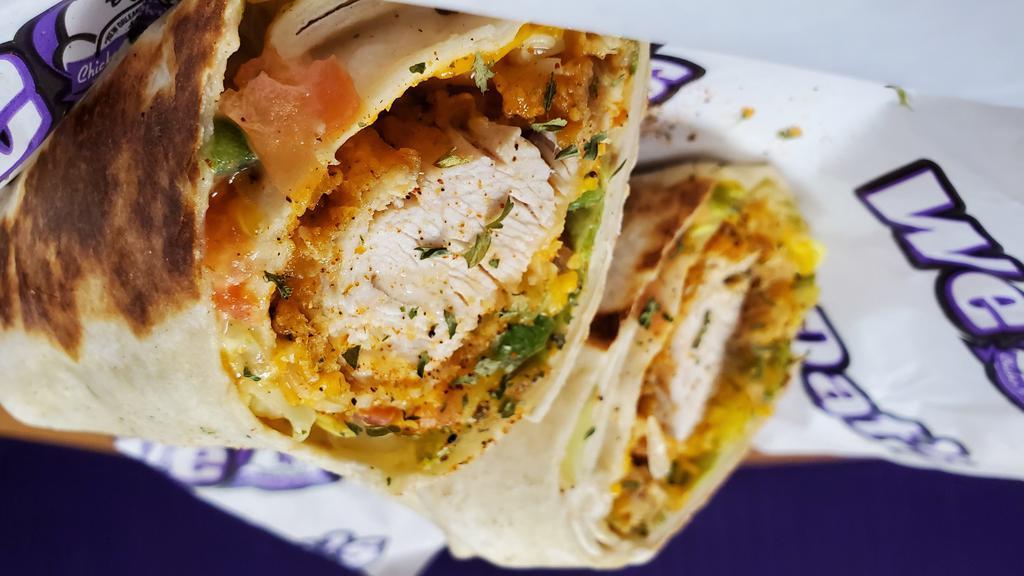 Chicken Wrap · Flour Tortilla stuffed with lettuce, tomatos, green peppers, cucumbers, cheese, hot sauce ,ranch and chicken