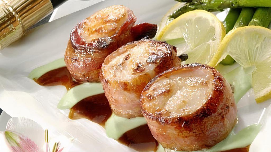 Bacon Wrapped Scallops · Grilled with ginger Teriyaki reduction Sauce & Wasabi
aioli, garnished with Asparagus Tempura.