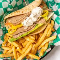 Gyro · Lamb and beef gyro with lettuce, tomatoes, onions, banana peppers, and tzatziki sauce on pit...