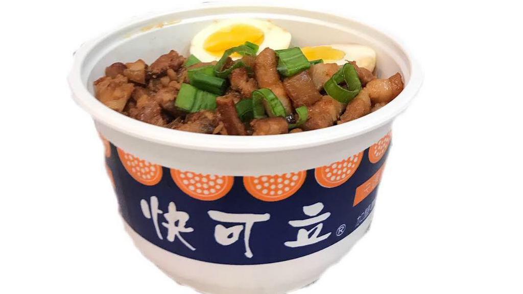 Braised Pork Bowl / 卤肉饭 · Stewed pork with steamed white  rice, Lettuce salad with sesame dressing, tea egg.