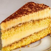 Tiramisu（提拉米苏） · Layers of sponge cake soaked in espresso and mascarpone cream dusted with cocoa powder.