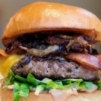 The Ringer · 1/4lb of certified black angus steak burger, topped with bacon, double Tillamook cheddar, sh...
