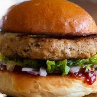 Turkey Burger · savory white turkey burger shredded lettuce, red onion, pickles & Camden's catsup , served o...