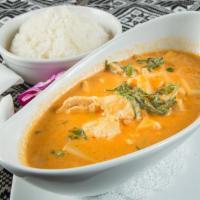 #30. Kang Dang · Medium. Thai red curry in coconut cream sauce with bamboo shoots, green peas, chili and swee...
