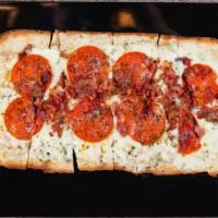 First Street Pepperoni Flatbread · Marinara base, with blend cheeses, pepperoni, roasted red peppers, banana peppers, oregano a...