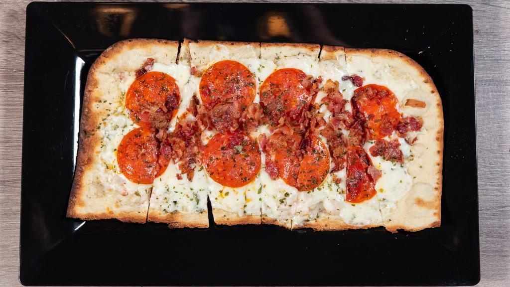First Street Pepperoni Flatbread · Marinara base, with blend cheeses, pepperoni, roasted red peppers, banana peppers, oregano and fresh basil.