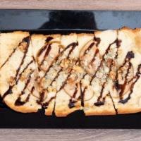 Pear Gorgonzola Flatbread · Olive oil base, blend cheeses, fresh sliced pears, roasted walnuts and gorgonzola cheese. To...