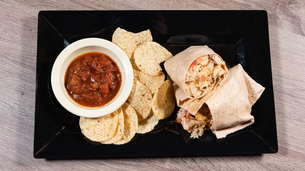 Deep South Dirty Bird · Blackened chicken with blue cheese crumbles, white queso, rice, pico, slow roasted tomato, and sriracha aioli rolled up in choice of wrap.
