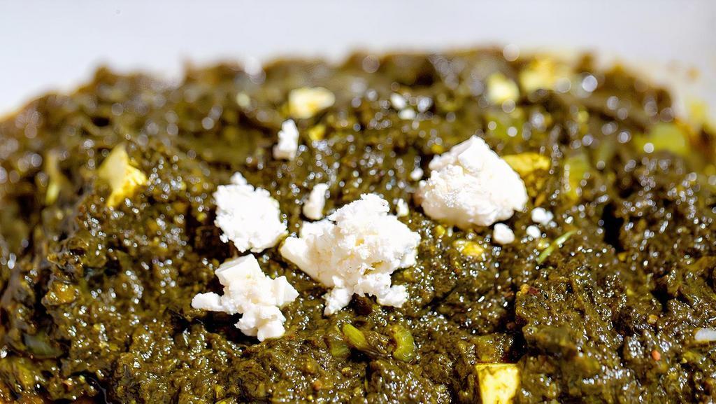 Saag Paneer · Creamed spinach, cottage cheese cubes and spices. Gluten free.