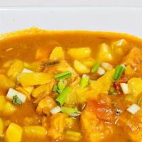 Patia (Gf) · Gluten-free. Spicy. Sweet mango curry, green onions and ginger flavor spiced.