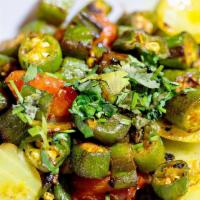 Bhindi Masala · Cut okra, peppers, onions, tomatoes, ginger and fenugreek masala.