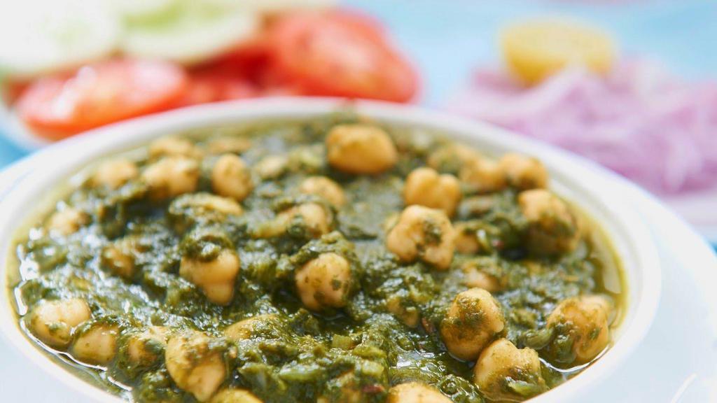 Chana Palak (Gf/V) · Spinach, flavorful spices with chickpeas.