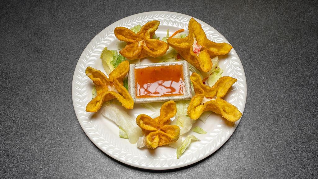 Crab Wontons · Fried Pastry filled with Krab, Cream Cheese & Scallions, Served with a Sweet Chili Sauce