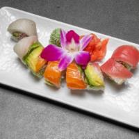 Rainbow · California Roll layered with Tuna, Salmon, White Fish and White Tuna