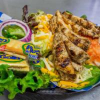 Char-Grilled Chicken Salad · Sliced Marinated Grilled Chicken, Mixed Greens, Diced Tomatoes, Shredded Cheese, 2 Red Onion...
