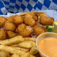 Shrimp Po' Boy Basket · Breaded shrimp fried golden brown with sweet chili mayo on a grilled butter hoagie and serve...