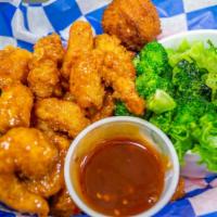 Sweet Chili Shrimp Basket · 1/2 pound fried shrimp tossed in sweet chili glaze served with steamed broccoli and house-ma...