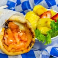 Buffalo Chicken · Buffalo chicken with pepper jack cheese, lettuce, tomato, and onion rolled in a warm pita.