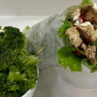 Pesto Chicken · Grilled chicken, basil pesto, lettuce, roasted red peppers, and goat cheese rolled in a warm...
