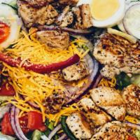 Grilled Chicken Chef Salad · Fresh Chopped Lettuce, Tomatoes, Cucumbers, Cheddar Cheese, Red Onion, Bell Peppers, Crouton...