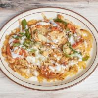 Juan Special · Choice of meat with onions, peppers and tomatoes in cheese dip. Served on a bed of rice. Chi...