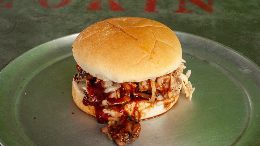 Bbq Chicken Sandwich Only · Applewood Smoked Chicken , Slaw, Pickles, Perfectly Awesome Sauce on a bun. (sandwich only)
