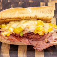 The Italian · Salami, Beef Pepperoni, Ham, Hot Pepper Cheese, Banana Peppers and Oil & Vinegar grilled on ...