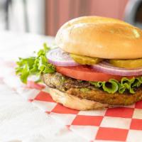 Veggie Burger · One of the best in town. Chock full of veggies and dressed to order.