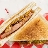 Fried Bologna Sandwich · Thick cut bologna, topped with grilled onion and cheddar cheese.