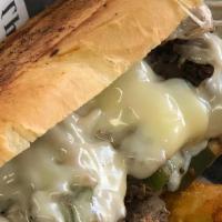 The Philly Steak · Philly steak, provolone cheese, grilled onion, grilled bell pepper, mayo, on toasted hoagie ...