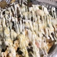 Philly Cheese Steak Loaded Fries · French fries topped with Philly steak, provolone cheese, grilled bell pepper, onion, drizzle...