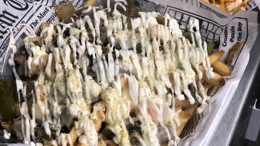 Philly Cheese Steak Loaded Fries · French fries topped with Philly steak, provolone cheese, grilled bell pepper, onion, drizzled with mayo.