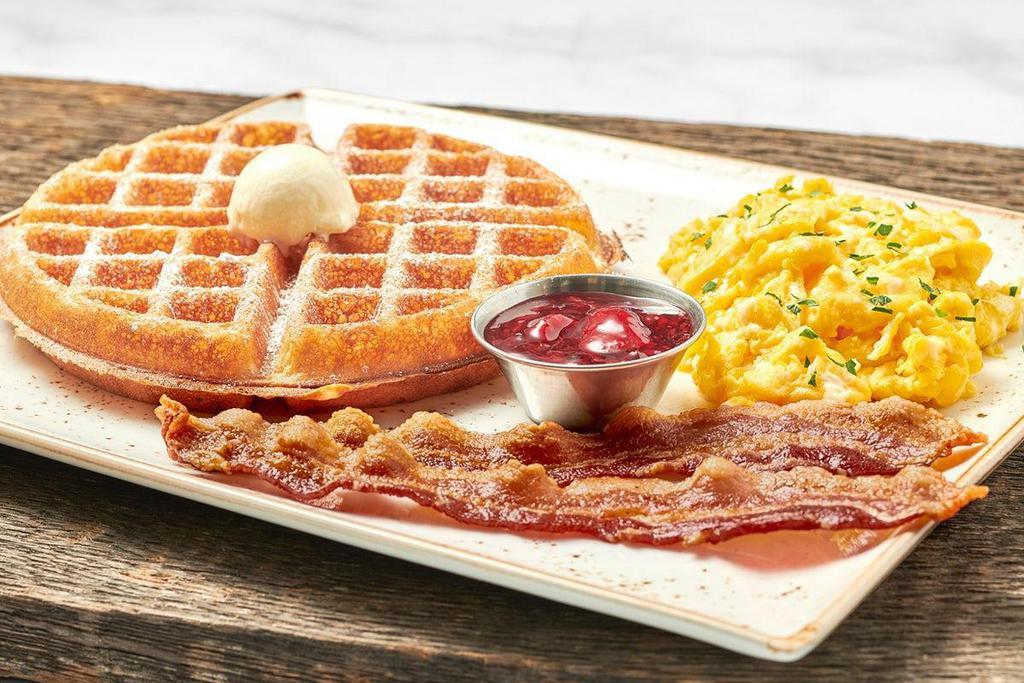 The Trifecta · Two fresh cage-free eggs any style with either a light and airy Belgian waffle or a multigrain pancake. Plus your choice of meat.