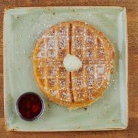 Belgian Waffle · Our light and airy waffle with a side of warm berry compote.