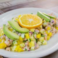 Ceviche Tropical * · Raw shrimp or fish marinated in lime juice , mixed with tomato , onions , cilantro , mango ,...