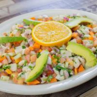 Ceviche Nayarit * · Fish marinated in lime juice , mixed with tomato , chopped onions , cilantro , cucumber , ca...