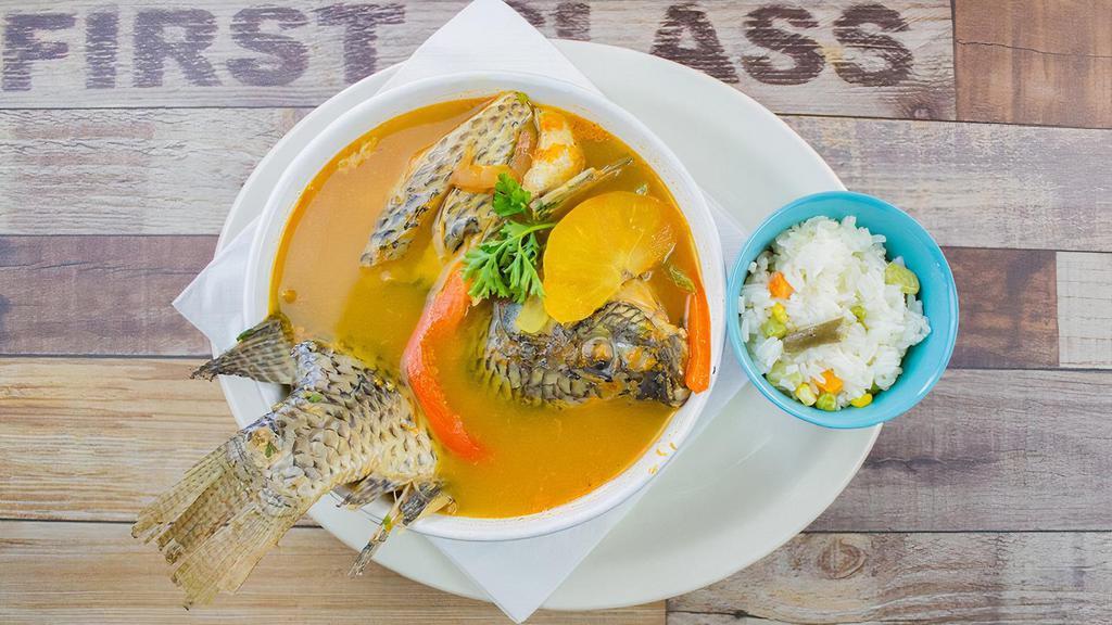 Mojarra Soup · Mojarra broth with onion and tomato , served with rice .