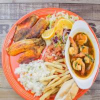 Guamuchil · Grilled filet and shrimp in creole sauce served with fries , rice , salad , pico de gallo an...