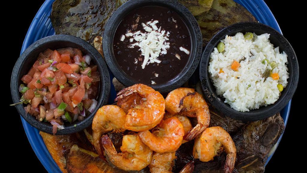 Molcajete Riviera * · Grilled beef ribs , chicken breast , 9 jumbo shrimps , cactus , onions , grilled jalapeno pepper , grilled panela cheese , served with our homemade molcajete sauce , rice , beans , pico de gallo and tortillas