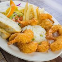 Coconut Shrimps · Crunchy coconut shrimps served with fries , salad , rice , garlic bread and our house dressi...