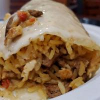 Burrito Texano · A large flour tortilla stuffed with steak, shrimp, chicken, rice, and beans covered with che...