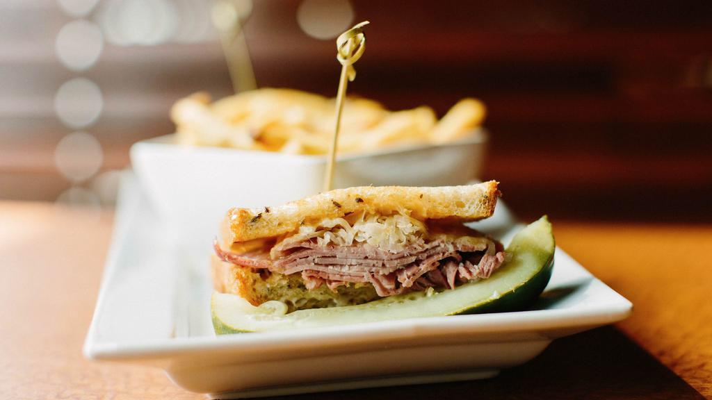 Reuben On Grilled Rye · Fresh sliced corned beef, sauerkraut, melted Swiss cheese, and thousand island dressing. Try it with turkey!