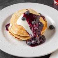 Lemon Ricotta Blueberry Pancakes · Wake up in style with three of our mouthwatering signature fluffy pancakes, with fresh blueb...