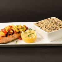 Grilled Salmon · Grilled salmon fillet topped with our fresh mango salsa and served with our homemade pearled...