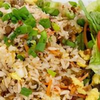 Arroz Chaufa · A Peruvian-style stir-fried rice with chicken, sausage, egg and scallions. Served with a sid...