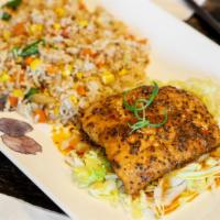 Grilled Salmon With Hibachi Fried Rice · Wild-caught Alaskan salmon naturally steamed with olive oil, cilantro, garlic, lime juice, s...