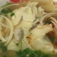 Egg Noodle Soup With Wonton · Served with rice noodles bean sprouts jalapeno peppers fresh basil leaves and a wedge of lime.