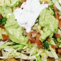 Nachos Supreme · choose chicken or beef, covered with refried beans, cheese, lettuce, sour cream, pico de gal...